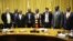 Zimbabwean President Emmerson Mnangagwa, his cabinet members and officials of Invictus Energy are pictured Nov. 1, 2018, after announcing the discovery of oil and gas deposits on Zimbabwe’s border with Mozambique. (C. Mavhunga/VOA)