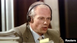 FILE: Janusz Walus testifies at the Truth and Reconciliation Commission hearing at Pretoria City Hall August 20, 1997. Polish immigrant Walus is seeking pardon for the assassination of popular communist party leader Chris Hani, in 1993.