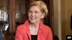 Sen. Elizabeth Warren, D-Mass., at a meeting on Capitol Hill in Washington, Nov. 27, 2017.