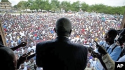 Presidential opposition candidate Winston Tubman speaks to supporters at a rally in Monrovia, Liberia, October 16, 2011.