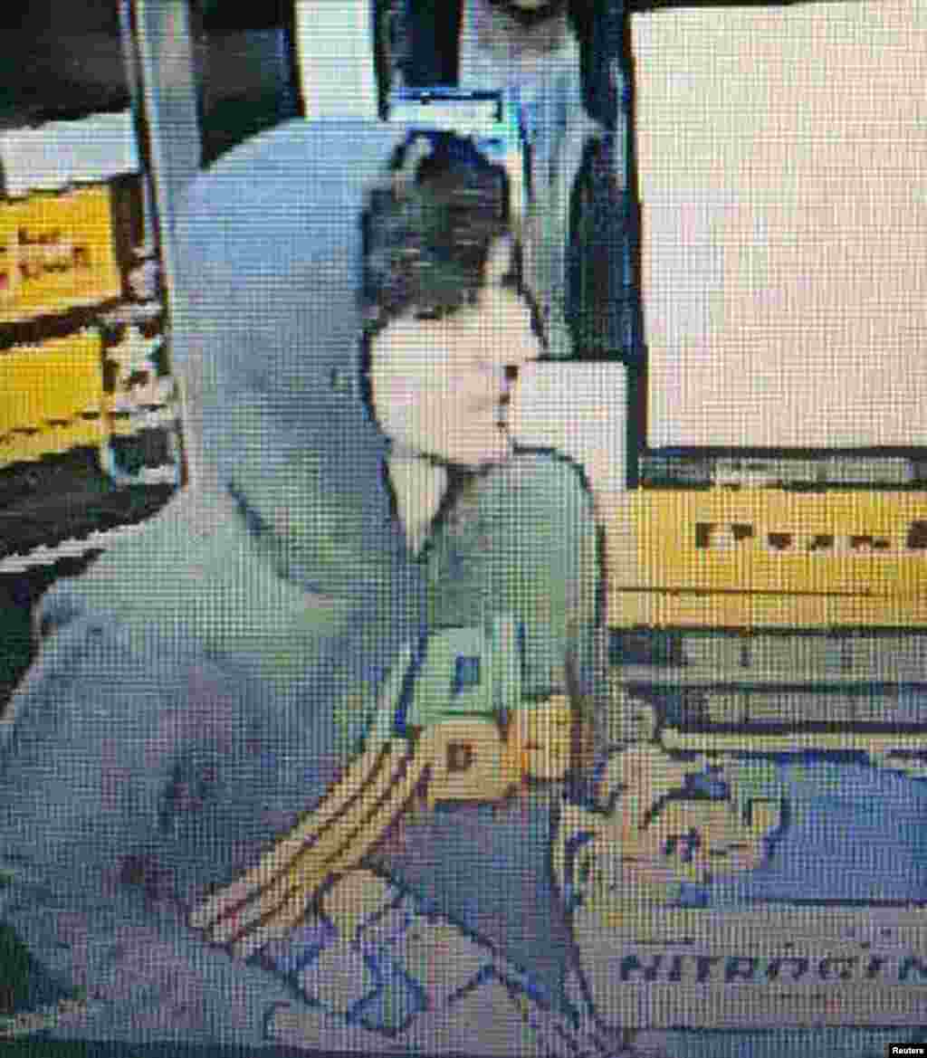A suspect wanted for questioning in relation to the April 15 Boston Marathon bombing is seen in handout photo released through the Boston Police Department Twitter page, April 19, 2013. 