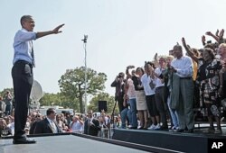 M. Obama a visité plusieurs villes, faisant la promotion de son plan économique. On le voit ici à Columbus, dans l' Ohio, le 13 septembre 2011