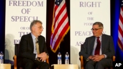 First Martin Baron, left, executive editor of the Washington Post, speaks as David Shribman, executive editor of the Pittsburgh Post-Gazette, listens at the National First Amendment Conference in Pittsburgh, Pennsylvania, Oct. 22, 2018.