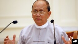 Burmese President Thein Sein talks during a press conference at Presidential House in Naypyitaw, Sunday, Oct. 21, 2012. 
