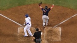 VOA Game Room - Beantown has baked another baseball champion, Federer has a winning homecoming, golf's winning name is Champ.