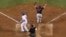 Home plate umpire Jeff Nelson makes the call while Boston Red Sox catcher Christian Vazquez celebrates as Los Angeles Dodgers' Manny Machado strikes out to end Game 5 of baseball's World Series against the Los Angeles Dodgers, Oct. 28, 2018.