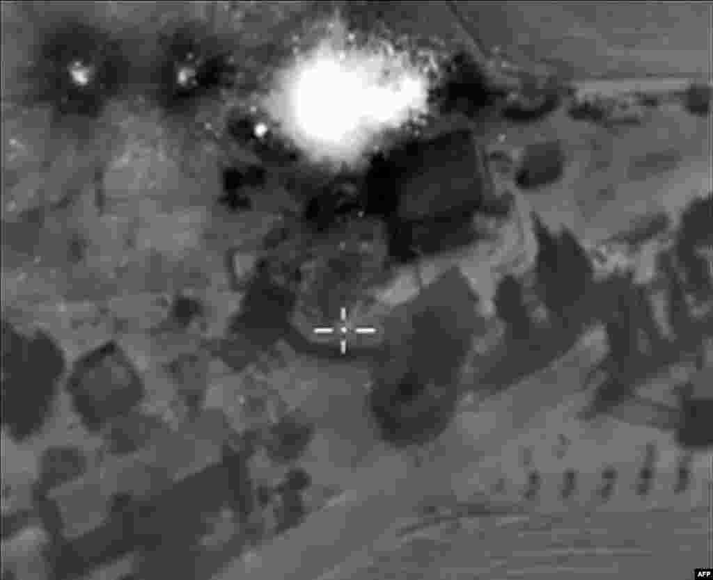 A video grab from Oct. 1, 2015 shows an image made available on the Russian Defense Ministry&#39;s official website, purporting to show an airstrike in Syria.