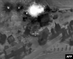 A video grab made on October 1, 2015, shows an image taken footage made available on the Russian Defense Ministry's official website, purporting to show an airstrike in Syria.