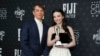 FILE - Sean Baker, left, and Mikey Madison, winners of the award for best picture for "Anora," pose at the 30th Critics Choice Awards at the Barker Hangar in Santa Monica, California, Feb. 7, 2025. (Photo by Jordan Strauss/Invision/AP)