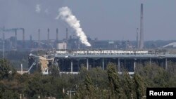 An exterior view shows the damaged main terminal of Donetsk Sergei Prokofiev International Airport in Donetsk, eastern Ukraine, Sept. 20, 2014.