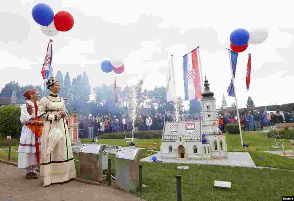 A miniature reproduction of Saint Mark&#39;s Church of Zagreb is inaugurated at Mini-Europe park in Brussels, Belgium. 