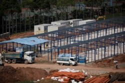 A general view of workers constructing "quick-build" semi-permanent dormitories to house migrant workers amid the coronavirus disease (COVID-19) outbreak in Singapore, June 9, 2020.