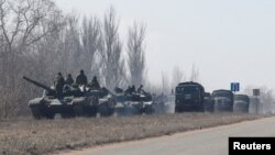 FILE PHOTO: A view shows a convoy of pro-Russian troops outside Volnovakha