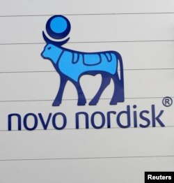 FILE - The logo of Danish multinational pharmaceutical company Novo Nordisk is pictured on the facade of a production plant in Chartres, north-central France, April 21, 2016.