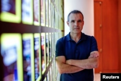 National Geographic Society explorer-in residence Enric Sala poses inside the Society's headquarters in Washington, D.C., Sept. 17, 2018.