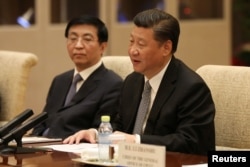 FILE - Chinese President Xi Jinping speaks with then-Italian Prime Minister Paolo Gentiloni (not pictured) during a bilateral meeting at Diaoyutai State Guesthouse in Beijing, China, May 16, 2017.