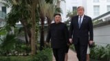 North Korean leader Kim Jong Un and U.S. President Donald Trump walk in the garden of the Metropole hotel during the second North Korea-U.S. summit in Hanoi, Vietnam February 28, 2019.