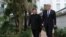 North Korean leader Kim Jong Un and U.S. President Donald Trump walk in the garden of the Metropole hotel during the second North Korea-U.S. summit in Hanoi, Vietnam February 28, 2019.