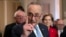 FILE - Senate Minority Leader Chuck Schumer, Democrat-New York, is flanked by colleagues, during a news conference, at the Capitol in Washington, Nov. 14, 2018.