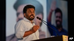 Leader and the presidential candidate of National People's Power Anura Kumara Dissanayake speaks to supporters during the final public rally ahead of the election in Colombo, Sri Lanka, Sept. 18, 2024.