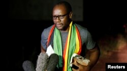 Activist pastor Evan Mawarire speaks to members of the media after he was released on bail from Chikurubi Maximum Prison in Harare, Zimbabwe, Jan. 30, 2019. 