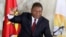 FILE - Mozambican President Felipe Nyusi poses at a polling station where he cast his vote in Maputo, Oct. 15, 2019. 