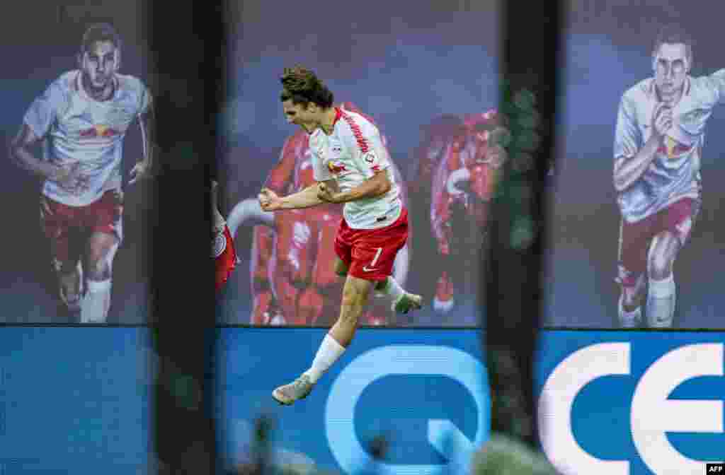 Leipzig&acute;s Austrian forward Marcel Sabitzer celebrates the third goal during the German first division Bundesliga football match RB Leipzig vs FC Nuremberg in Leipzig, eastern Germany.