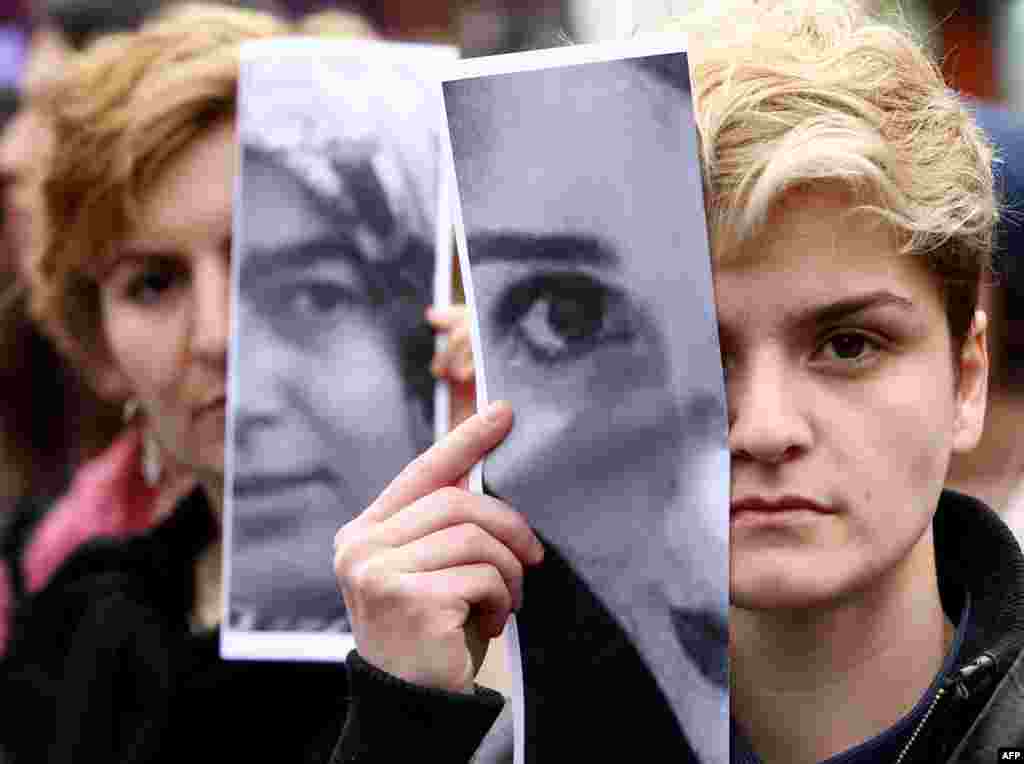 Turkish women display photographs of slain student, Özgecan Aslan, who was killed while resisting an attempted rape, and other victims of violence against women during a demonstration in Ankara. Three men went on trial over the murder, in a case that sparked an outpouring of anger over the level of violence against women in the country.