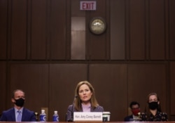 U.S. Supreme Court nominee Judge Amy Coney Barrett testifies on the third day of her U.S. Senate Judiciary Committee confirmation hearing on Capitol Hill in Washington, Oct. 14, 2020.