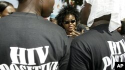 Protestors demand free HIV/AIDS treatment for persons living with HIV in Abuja, Nigeria (Dec 5, 2005). (George Osodi / AP Photo)