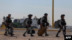 Mexican National Guard members arrive at Abraham Gonzalez International Airport in Ciudad Juarez, Chihuahua state, Mexico, Feb. 4, 2025.