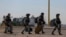 Mexican National Guard members get  astatine  Abraham Gonzalez International Airport successful  Ciudad Juarez, Chihuahua state, Mexico, Feb. 4, 2025.