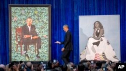 Portreti bivšeg predsednika SAD Baraka Obame i bivše prve dame Michelle Obame