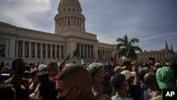 People protest in front of the Capitol in Havana, Cuba, Sunday, July 11, 2021. (AP Photo/Ramon Espinosa)