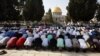 Palestinians pray inside the al-Aqsa Mosque compound in Jerusalem's Old City, July 27, 2017. Anticipated unrest there Friday did not materialize.