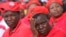 Women listen to political address by the head of the opposition Movement for Democratic Change in Harare, May, 19, 2013.