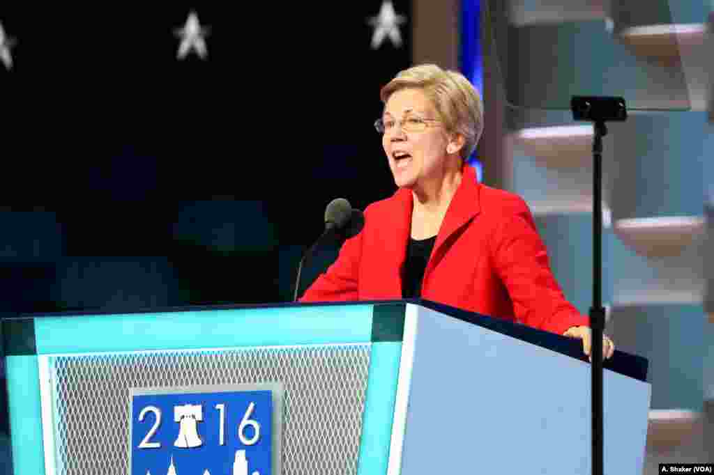 Massachusetts Senator Elizabeth Warren revved up the crowd with a forceful attack on Republican Donald Trump at the Democratic National Convention in Philadelphia July 25, 2016 (A. Shaker/VOA)