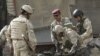 Bomb Blasts Around Baghdad Kill 15