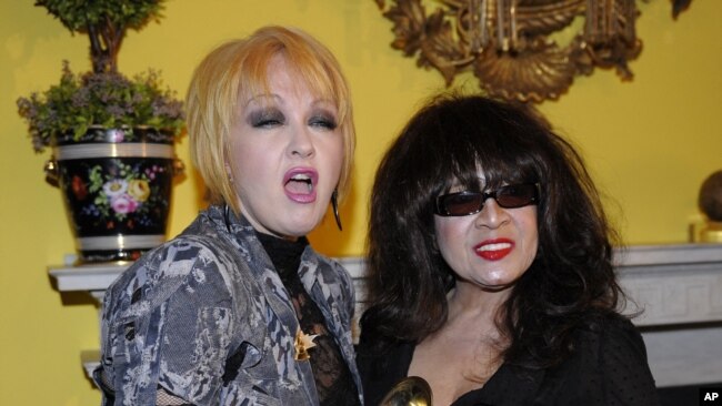 FILE - Singers Cyndi Lauper and Ronnie Spector are pictured during a reception at Gracie Mansion in New York, Jan. 20, 2011. Spector died Jan. 12, 2022, at age 78.