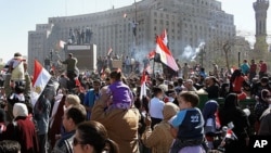 Crowds turn out to celebrate Friday in Cairo's Tahrir Square, marking the success of a popular uprising and honoring the protesters who were killed, February 18, 2011