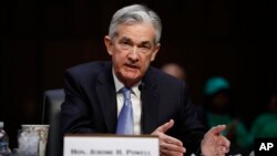 FILE - Jerome Powell, President Donald Trump's nominee for chairman of the Federal Reserve, testifies during a Senate Banking, Housing, and Urban Affairs Committee confirmation hearing on Capitol Hill, Nov. 28, 2017.