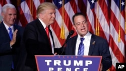 FILE - In this Nov. 9, 2016, file photo, President-elect Donald Trump, left, stands with Republican National Committee Chairman Reince Priebus during an election night rally in New York. 