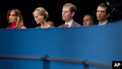 FILE - From left, Melania Trump, Ivanka Trump, Eric Trump, and Donald Trump, Jr., the family of Republican President-elect Donald Trump