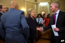 Democratic presidential candidate former Secretary of State Hillary Rodham Clinton shakes hands with House Select Committee on Benghazi chairman Rep. Trey Gowdy, R-S.C., at the conclusion of a hearing, on Capitol Hill on Thursday, Oct. 22, 2015