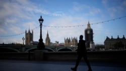 This file photo shows a view of the scaffolded Elizabeth Tower, known as Big Ben, and the Houses of Parliament from the other side of the River Thames, in London, Thursday, on Oct. 14, 2021. (AP Photo/Matt Dunham, File)