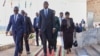 President of Mozambique Daniel Chapo, center, arrives for a summit in Harare, Zimbabwe, Jan. 31, 2025. Mozambican authorities have assured refugees who fled to Malawi after post-election unrest that peace has been restored and they are welcome to return home.