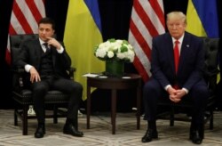 Ukraine's President Volodymyr Zelenskiy and U.S. President Donald Trump face reporters during a bilateral meeting on the sidelines of the 74th session of the United Nations General Assembly in New York, Sept. 25, 2019.