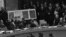 In this October 25, 1962 file photo, U.S. Ambassador Adlai Stevenson, far right, describes aerial photographs of launching sites for intermediate range missiles in Cuba during an emergency session of the United Nations Security Council at U.N. Headquarter