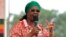 Zimbabwe's First Lady Grace Mugabe addresses her maiden political rally in Chinhoyi after she was nominated to head the Zanu PF ruling party women's league two months ago, Oct. 2, 2014. 