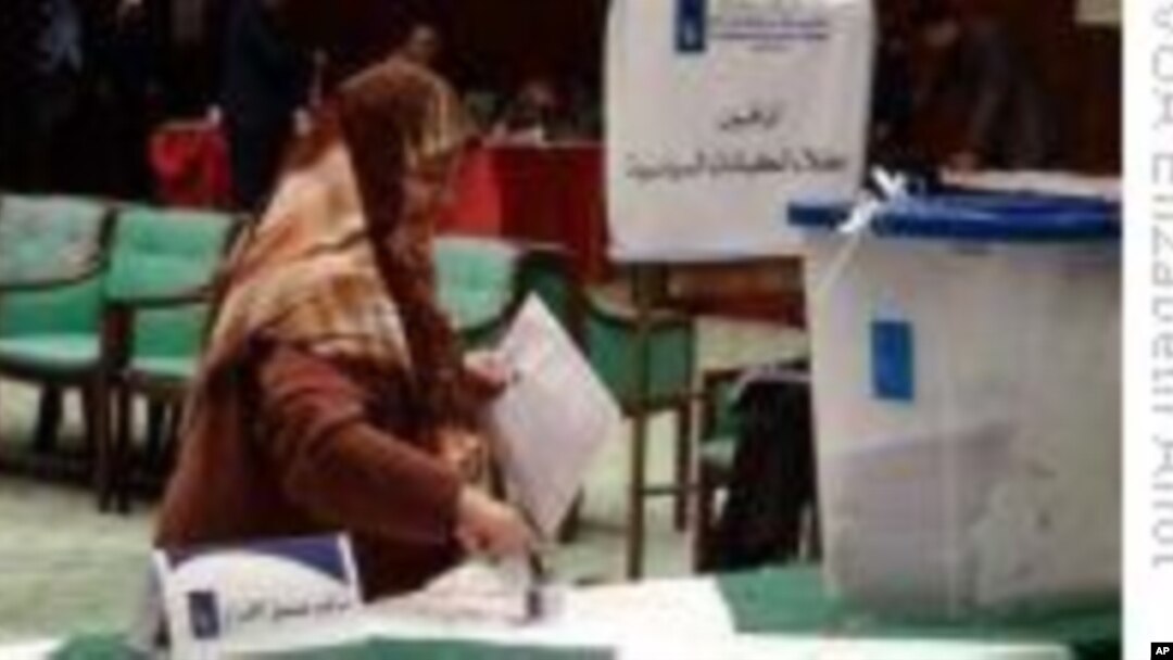 ژنێـک ده‌نگی خۆی له‌ هه‌ڵبژاردنه‌ په‌رله‌مانیـیه‌که‌ی 7 ی سێی عێراقدا ده‌دات